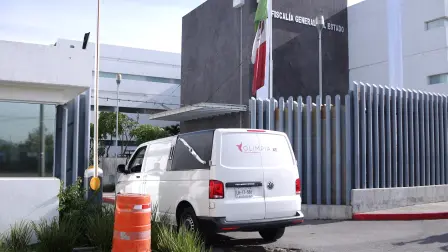 A funeral vehicle carrying the remains of Spanish exchange student Claudia Tacoronte, who was killed in Mexico, arrives at the Attorney General's Office as her parents travel to Morelos to identify her body, in Temixco, Mexico, September 18, 2026. REUTERS/Margarito Perez Retana