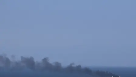 This photograph shows smoke rising from a civilian cargo ship Golden Leo following an alleged Russian missile strike, on the Black Sea near Odesa on July 19, 2026, amid the Russian invasion of Ukraine. Ukraine's navy said on July 19, 2026 that Russian missile strikes on a Turkish-owned cargo ship carrying grain had killed six people on board, while another four crew members were missing. Russia launched three cruise missiles at the Golden Leo, which flies the flag of Guinea-Bissau, as it was "leaving the combat zone with a cargo of grain", the Ukrainian navy said in a statement. (Photo by AFP) / The erroneous mention[s] appearing in the metadata of this photo by STRINGER has been modified in AFP systems in the following manner: [killed six people on board, while another four crew members were missing] instead of [killed five people on board, while another five crew members were missing]. Please immediately remove the erroneous mention[s] from all your online services and delete it (them) from your servers. If you have been authorized by AFP to distribute it (them) to third parties, please ensure that the same actions are carried out by them. Failure to promptly comply with these instructions will entail liability on your part for any continued or post notification usage. Therefore we thank you very much for all your attention and prompt action. We are sorry for the inconvenience this notification may cause and remain at your disposal for any further information you may require.
