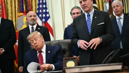 US President Donald Trump listens to US Senator Dan  Sullivan, Republican from Alaska, as he makes an announcement with US Secretary of Commerce Howard Lutnick (L) in the Oval Office of the White House in Washington, DC, on September 30, 2026. (Photo by Kent NISHIMURA / AFP)