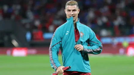 Portugal's forward #07 Cristiano Ronaldo gestures ahead of the UEFA Nations League league phase group A4 football match between Portugal and Wales at Jose Alvalade stadium in Lisbon on September 24, 2026. (Photo by Patricia de Melo Moreira / AFP)
