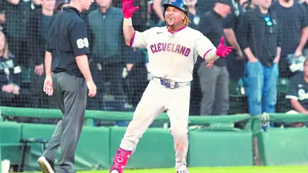 Oct 7, 2026; Chicago, Illinois, USA;  Cleveland Guardians third baseman Jose Ramirez (11) celebrates after hitting an RBI triple during the eighth inning against the Chicago White Sox in game three of the ALDS for the 2026 MLB Playoffs at Rate Field.  Mandatory Credit: David Banks-Imagn Images