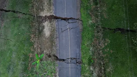 A drone view shows a road damaged by a ground fissure following an earthquake that struck near Panama's southern coast in Tonosi, Panama, October 10, 2026. REUTERS/Enea Lebrun