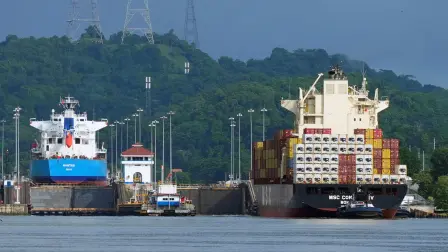 The Norway-flagged LPG tanker Nantes (L) and the Liberia-flagged container ship MSC Conakry IV sail through the Panama Canal near the Pedro Miguel Locks in Panama City on September 4, 2026, as a reduction in canal transits linked to the El Niño phenomenon comes into force. Panama has declared an emergency over El Nino, which raises surface temperatures in the central and eastern equatorial Pacific Ocean and causes global changes in winds and rainfall as well as erratic weather conditions. (Photo by ARNULFO FRANCO / AFP)