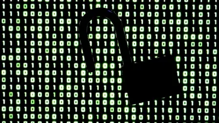 An illustration picture taken on October 21, 2026 shows a padlock in front of binary code on a laptop screen in Frankfurt am Main, western Germany. Government agencies and companies around the world shut down websites on October 21, 2026 after two critical flaws came to light involving PHP, a programming language that is the basis for a large share of the internet. (Photo by Kirill KUDRYAVTSEV / AFP)
