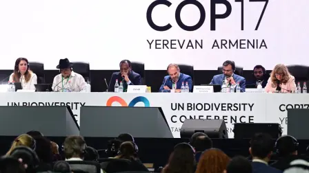 Gaute Hansen of Norway (C) chairs a plenary session at the 17th UN Biodiversity conference (COP 17) in Yerevan on October 30, 2026. (Photo by Karen MINASYAN / AFP)