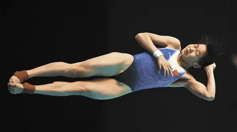 Hongchan Quan, clavadista china.