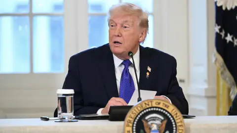 US President Donald Trump speaks during a meeting with US oil companies executives in the East Room of the White House in Washington, DC on January 9, 2026. President Trump is aiming to convince oil executives to support his plans in Venezuela, a country whose energy resources he says he expects to control for years to come. US forces seized Venezuelan president Nicolas Maduro in a sweeping military operation on January 3, with Trump making no secret that control of Venezuela's oil was at the heart of his actions. (Photo by SAUL LOEB / AFP)