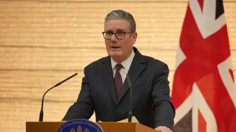 British Prime Minister Keir Starmer and Japanese Prime Minister Sanae Takaichi (not pictured) take part in a joint press conference after their bilateral meeting at the Prime Minister's Office in Tokyo on January 31, 2026. (Photo by Kin Cheung / POOL / AFP)