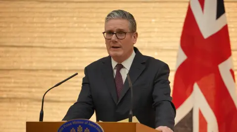 British Prime Minister Keir Starmer and Japanese Prime Minister Sanae Takaichi (not pictured) take part in a joint press conference after their bilateral meeting at the Prime Minister's Office in Tokyo on January 31, 2026. (Photo by Kin Cheung / POOL / AFP)