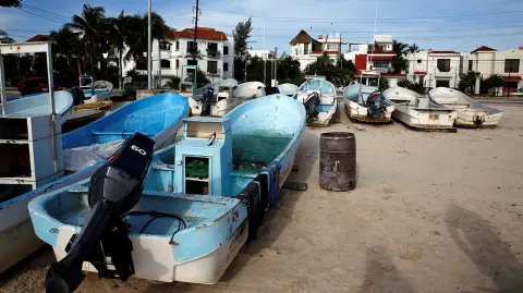 Boats are seen at the beach after  Tropical Storm Nate in Cancun - Boats are seen at the beach after  Tropical Storm Nate in Cancun, Mexico October 7, 2017. REUTERS/Henry Romero