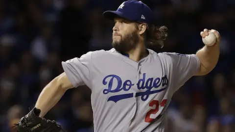 Clayton Kershaw - Los Angeles Dodgers starting pitcher Clayton Kershaw (22) throws during the first inning of Game 5 of baseball