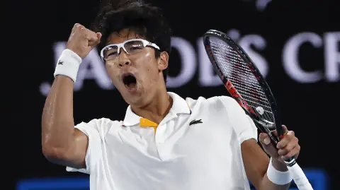 Tennis - Australian Open - Rod Laver Arena, Melbourne, Australia - Tennis - Australian Open - Rod Laver Arena, Melbourne, Australia, January 22, 2018. Chung Hyeon of South Korea reacts during his match against Novak Djokovic of Serbia. REUTERS/Issei Kato