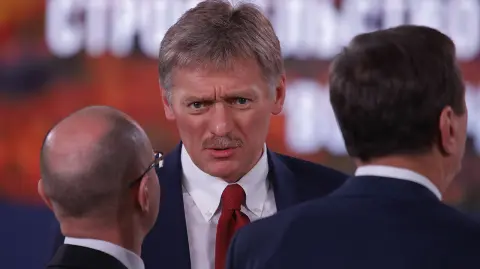 Kremlin spokesman Peskov is seen before Russian President Putin