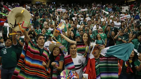 Fans of Mexico cheer for their team during an international friendly soccer match between Mexico and Scotland at Azteca Stadium in Mexico City, Saturday, June 2, 2018. (AP Photo/Eduardo Verdugo)