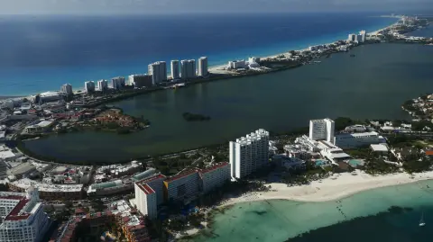 Wider Image: Earthprints: Cancun