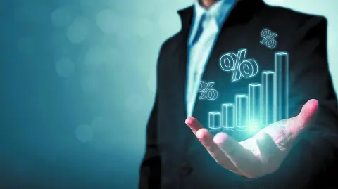Interest rate financial and mortgage rates concept. Businessman hand show icon percent 3d sign with graph indicator