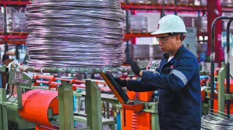 An employee works inside a stainless steel manufacturing plant, in Tlaxcala, Mexico, February 11, 2025. REUTERS/Hector Lorenzo