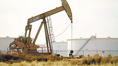 A pump jack operates near a crude oil reserve in the Permian Basin oil field near Midland, Texas, U.S. February 18, 2025.  REUTERS/Eli Hartman