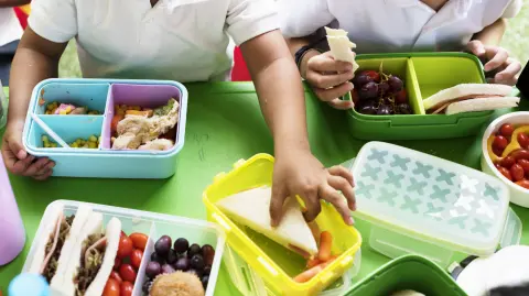 Kids eating lunch at elementary school