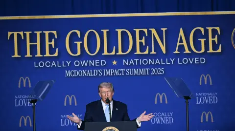 US President Donald Trump delivers remarks at McDonald's Impact Summit in Washington, DC on November 17, 2025. (Photo by Brendan SMIALOWSKI / AFP)