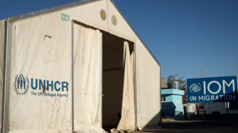 A closed registration centre of the United Nations High Commissioner for Refugees (UNHCR) at the Zero Point Islam Qala border crossing between Afghanistan and Iran, in Herat province, on November 5, 2025. The United Nations on November 4 suspended operations at a key border crossing between Afghanistan and Iran because of new Taliban government restrictions on Afghan women workers, a UN official said. (Photo by Mohsen KARIMI / AFP)