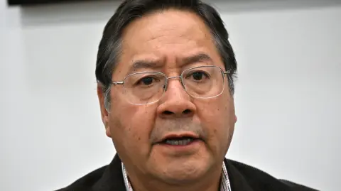 Bolivia's President Luis Arce Catacora speaks during an interview with AFP at the Casa Grande del Pueblo in La Paz on June 18, 2025. (Photo by AIZAR RALDES / AFP)