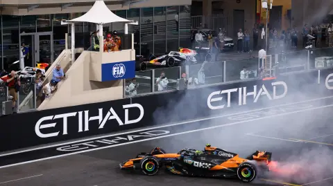 Formula One F1 - Abu Dhabi Grand Prix - Yas Marina Circuit, Abu Dhabi, United Arab Emirates - December 7, 2025 McLaren's Lando Norris celebrates after becoming the 2025 Formula One World Champion REUTERS/Amr Alfiky