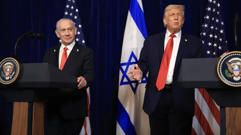 PALM BEACH, FLORIDA - DECEMBER 29: U.S. President Donald Trump holds a press conference with Israeli Prime Minister Benjamin Netanyahu at his Mar-a-Lago club on December 29, 2025 in Palm Beach, Florida. The two leaders held a bilateral meeting to discuss regional security in the Middle East as well as the U.S.-Israel partnership.   Joe Raedle/Getty Images/AFP (Photo by JOE RAEDLE / GETTY IMAGES NORTH AMERICA / Getty Images via AFP)