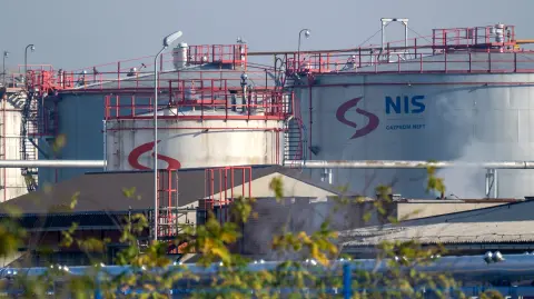 This photograph shows the Petroleum Industry of Serbia (NIS), Serbias only oil refinery, which has halted production and is in the process of shutting down due to US sanctions in Pancevo on December 10, 2025. The refinery  that previously supplied around 80 percent of Serbias fuel needs  has been unable to receive crude oil since October 9, 2025 after its Russian majority owners were hit by US sanctions over Moscows invasion of Ukraine. (Photo by Andrej ISAKOVIC / AFP)