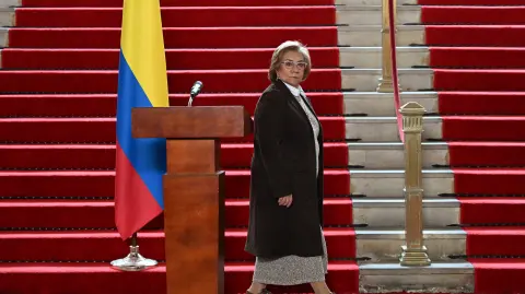 Colombian Foreign minister Rosa Villavicencio leaves after a press conference amid Venezuela-US crisis at San Carlos Palace in Bogota on January 6, 2026. (Photo by LUIS ACOSTA / AFP)