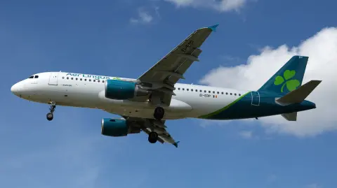 An Aer Lingus Airbus A320-214 comes in to land at Heathrow Airport in west London on April 29, 2024. (Photo by Adrian DENNIS / AFP)