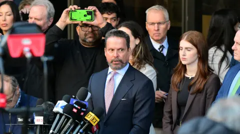 Attorney Alan Jackson speaks to the press after exiting the courthouse during Nick Reiner's arraignment on charges of murdering his parents Rob and Michele Reiner, at Los Angeles Superior Court on January 7, 2026, in Los Angeles, California. Jackson withdrew as Reiners attorney and Reiner will now be represented by the county Public Defender's Office. Reiner faces two counts of first-degree murder over the double killing that sent shockwaves through Hollywood just days before Christmas. The 32-year-old was arrested on December 14 after the bodies of his filmmaker father, and his mother, photographer Michele Singer Reiner were discovered at their home in the upmarket Brentwood neighborhood of Los Angeles. (Photo by Frederic J. Brown / AFP)
