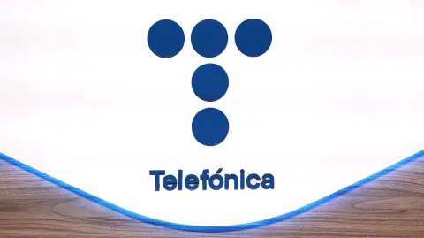 This photograph shows Telefonica's logo during a press conference to announce the company's yearly results for 2023 in Madrid on February 22, 2024. Spanish telecoms giant Telefonica said it swung to a loss in 2023 despite higher revenue after making provisions for layoffs in its domestic business. (Photo by Thomas COEX / AFP)