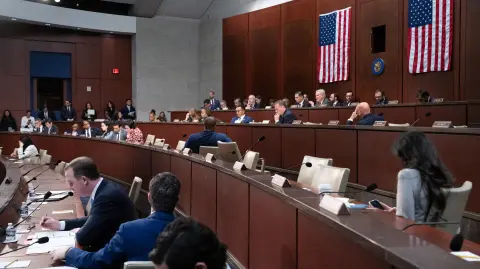 Members of the House Committee on Oversight and Government Reform hold a markup committee meeting on holding former US President Bill Clinton and former US Secretary of State Hillary Clinton in Contempt of Congress for refusal to comply with a subpoena issued by the committee, on Capitol Hill in Washington, DC, January 21, 2026. A US House panel was set to vote Wednesday on whether to launch contempt of Congress proceedings against Bill and Hillary Clinton over their refusal to testify before its politically charged investigation into sex offender Jeffrey Epstein. (Photo by SAUL LOEB / AFP)