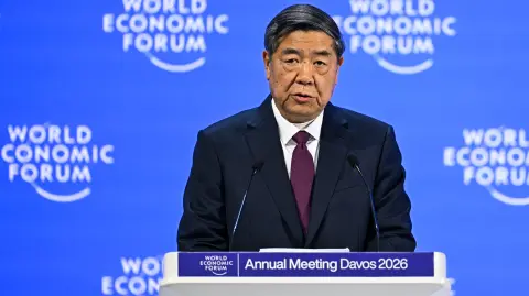 China's Vice-Premier He Lifeng delivers a speech during the World Economic Forum (WEF) annual meeting in Davos on January 20, 2026. The World Economic Forum takes place in Davos from January 19 to January 23, 2026. (Photo by Fabrice COFFRINI / AFP)