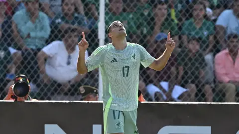 Mexico's forward #17 German Berterame celebrates scoring his team's first goal during the international friendly football match between Bolivia and Mexico at the Ramon Aguilera Costa Stadium in Santa Cruz de la Sierra, Bolivia on January 25, 2026. (Photo by Aizar RALDES / AFP)
