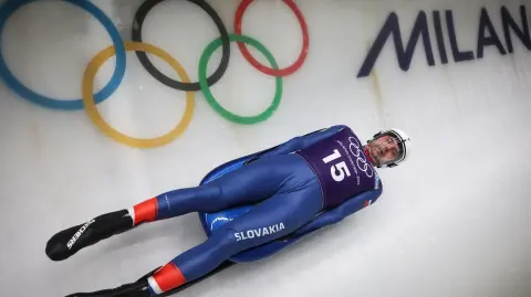 Slovakia's Jozef Ninis takes part in the luge men's singles training session at Cortina Sliding Centre during the Milano Cortina 2026 Winter Olympic Games in Cortina d'Ampezzo on February 4, 2026. (Photo by FRANCK FIFE / AFP)