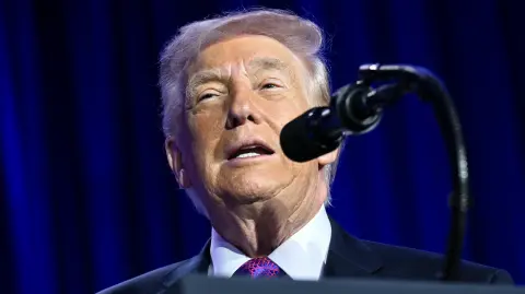 US President Trump speaks during the National Prayer Breakfast at the Washington Hilton in Washington, DC on February 5, 2026. (Photo by SAUL LOEB / AFP)