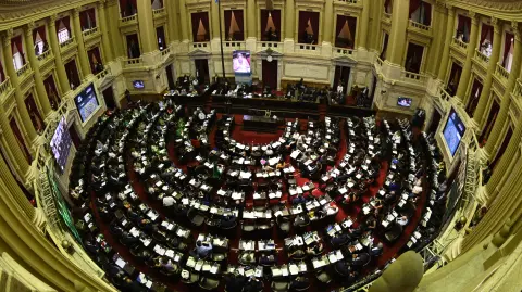 Aerial view of the Argentine Chamber of Deputies during a session in which a bill for legalization of abortion was started to be debated in Buenos Aires on december 10, 2020. The Argentine Chamber of Deputies stated debating Thursday a bill for the legalization of abortion, after a similar initiative failed two years ago, in a session that will be extended until Friday. (Photo by JUAN MABROMATA / AFP)