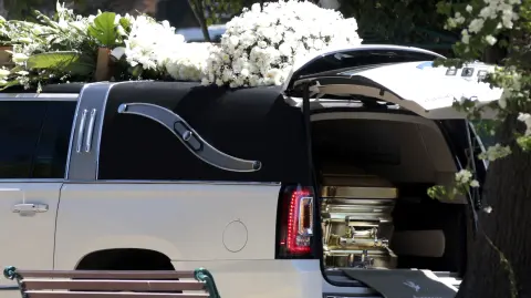 The hearse of drug trafficker Nemesio "El Mencho" Oseguera is pictured at the Recinto de la Paz cemetery in Zapopan, Jalisco state, Mexico, on March 2, 2026. Mexican soldiers watched over the funeral of Oseguera, who died on February 22 during a military operation. (Photo by Ulises RUIZ / AFP)