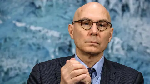 UN High Commissioner for Human Rights Volker Turk looks on at the opening of the 61st session of the UN Human Rights Council at the United Nations office in Geneva on February 23, 2026. Human rights are under "full-scale attack around the world", United Nations chief Antonio Guterres warned on February 23, 2026, with the most powerful often leading the charge. (Photo by Fabrice COFFRINI / AFP)