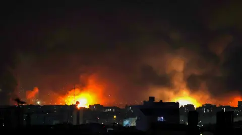 Smoke and fire rise from the site of airstrikes at Mehrabad International Airport in Tehran on March 7, 2026. Israel said on March 7 it had launched "broad-scale" strikes on targets in Tehran, as the Iranian state broadcaster reported an explosion in the western part of the city. (Photo by ATTA KENARE / AFP)