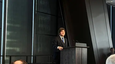Argentine President Javier Milei speaks as part of the Argentina Week event at the JPMorgan Chase & Co. headquarters in New York City, U.S., March 10, 2026. REUTERS/Rodrigo Campos