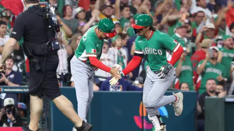 Mar 9, 2026; Houston, TX, United States; Mexico outfielder Jarren Duran (16) celebrates a home run in the eighth inning against the United States at Daikin Park. Mandatory Credit: Troy Taormina-Imagn Images