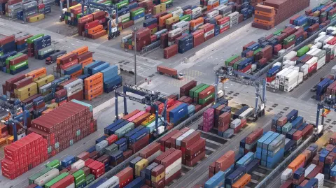 Cargo containers are seen in Nanjing port, in Chinas eastern Jiangsu province on March 10, 2026. (Photo by CN-STR / AFP) / China OUT / CHINA OUT
