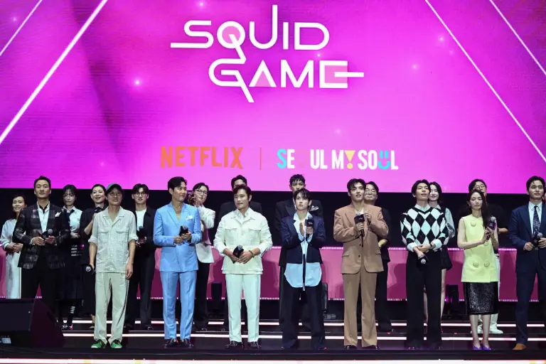 South Korean director Hwang Dong-hyuk and the cast at a fan event for Netflix's Squid Game Season 3
