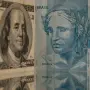 100 dólares estadounidenses vs 100 reales brasileños.